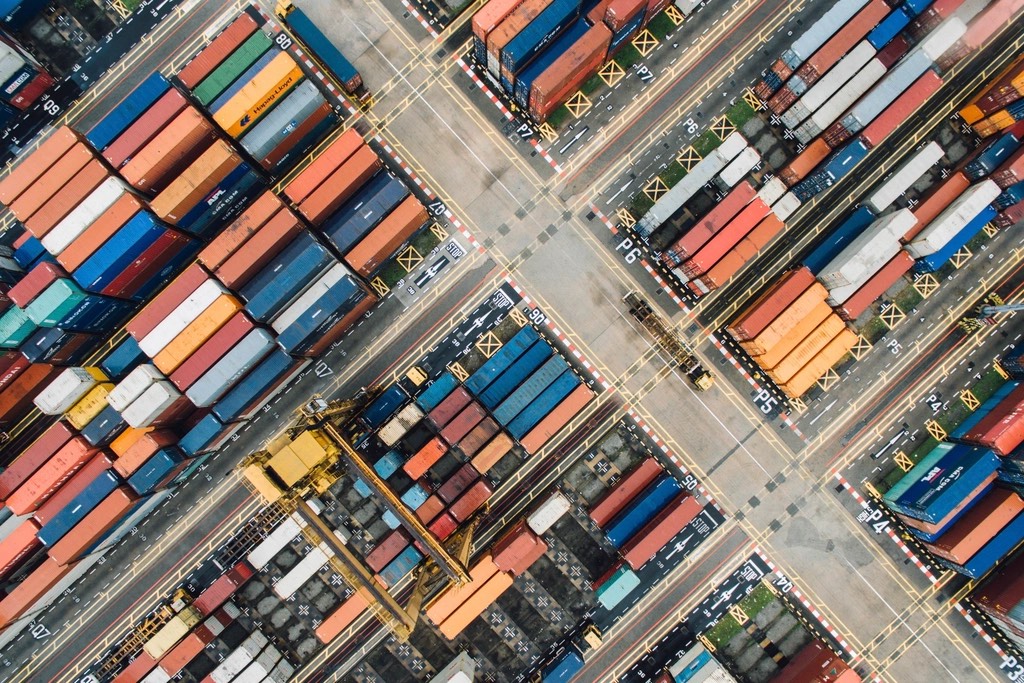 Aerial view of a container terminal stacked with shipping containers