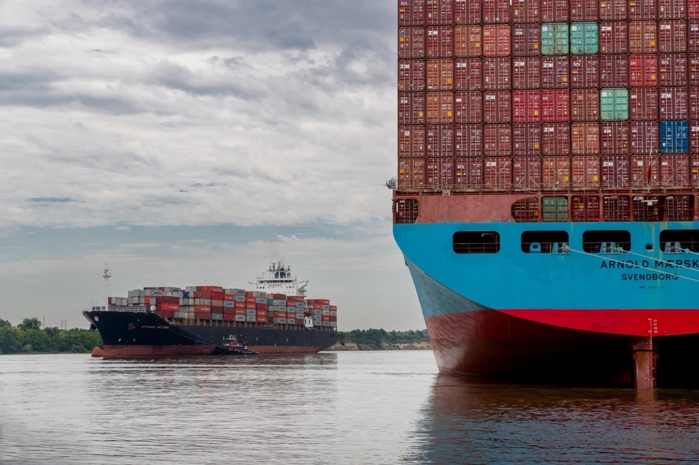 Container ships carrying cargo between ports